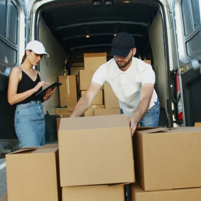 freight quote form example with boxes being loaded into a delivery van